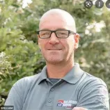 Professional portrait of a Northern Knife team member in a branded polo shirt, emphasizing expert customer service and reliability.